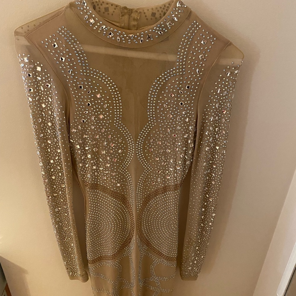 Dress from Windsors. Stain on front but will come out after sending to cleaner